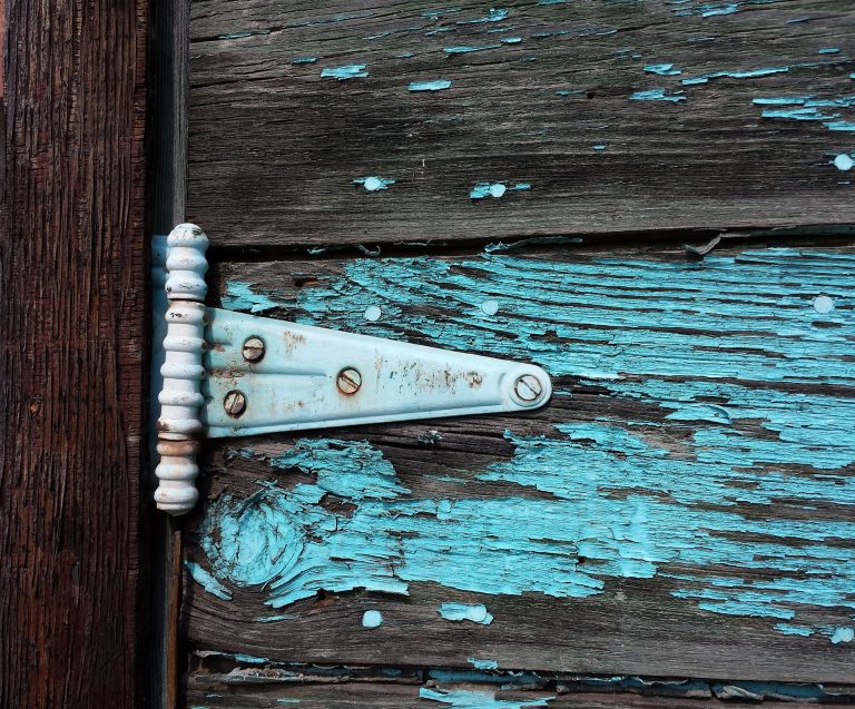 Garage Door Repair Tips How to Replace a Broken Hinge